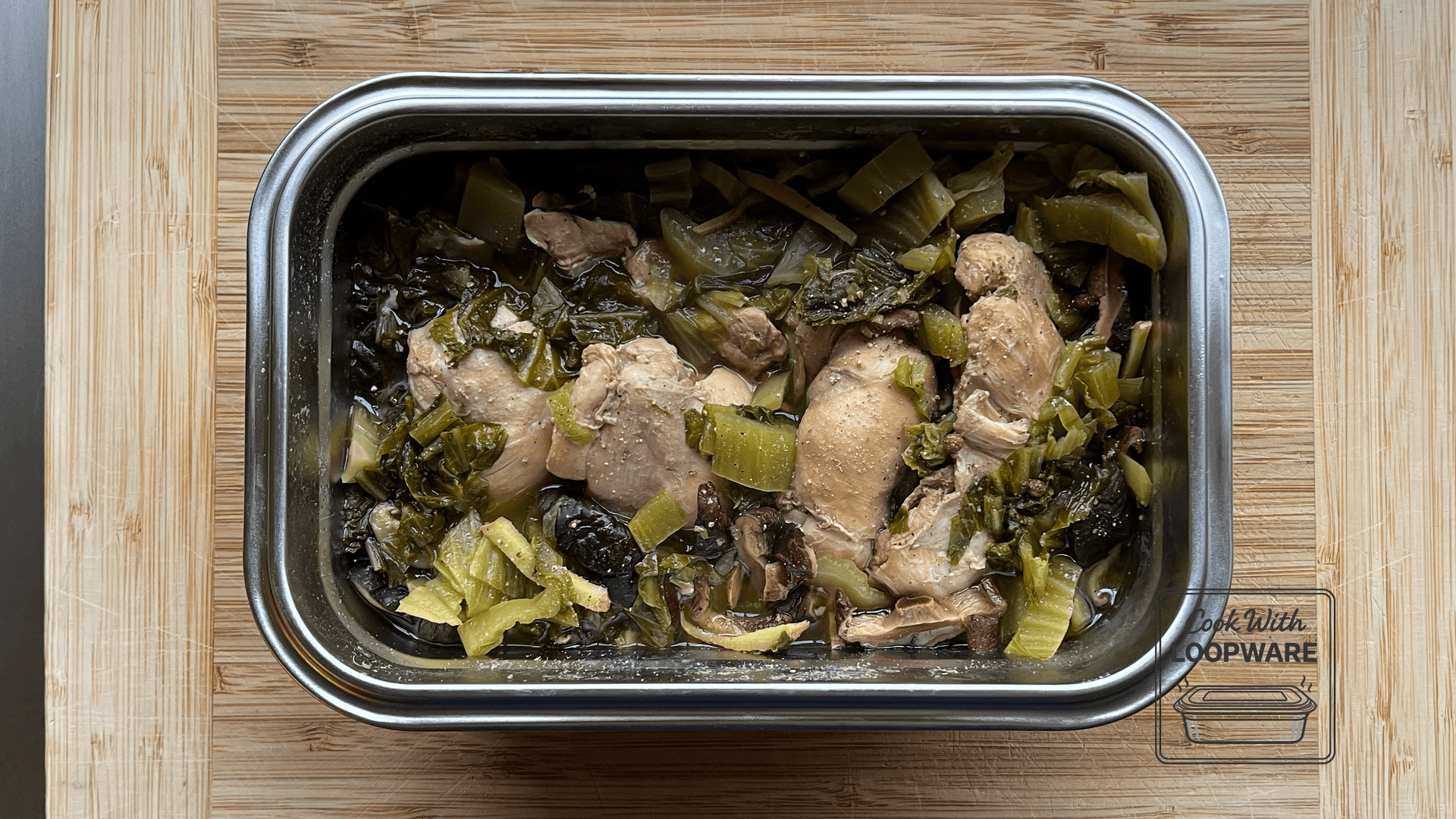 Sour Cabbage & Chicken Hotpot (Suan Cai Ji) in a Loopware stainless steel cooking container